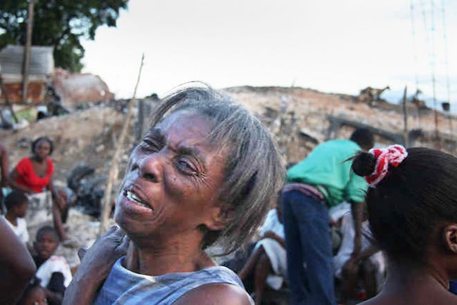 The population of Haiti was devastated by an earthquake Tuesday. A woman is shown crying amid the rubble.