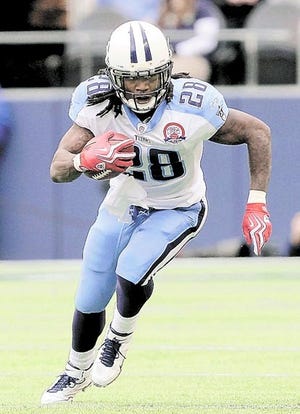 Tennessee Titans running back Chris Johnson carries the ball against the Seattle Seahawks during a Jan. 3 game in Seattle.