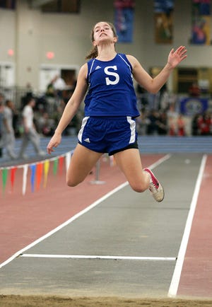 Scituate's Meredith Barthold competes in the long jump during the MSTCA state relays on Sunday at the Reggie Lewis Center in Boston.