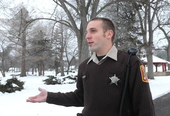 Freeport Park District Officer Jeff Zalaznik talks about the duties of the park police in Read Park Monday.