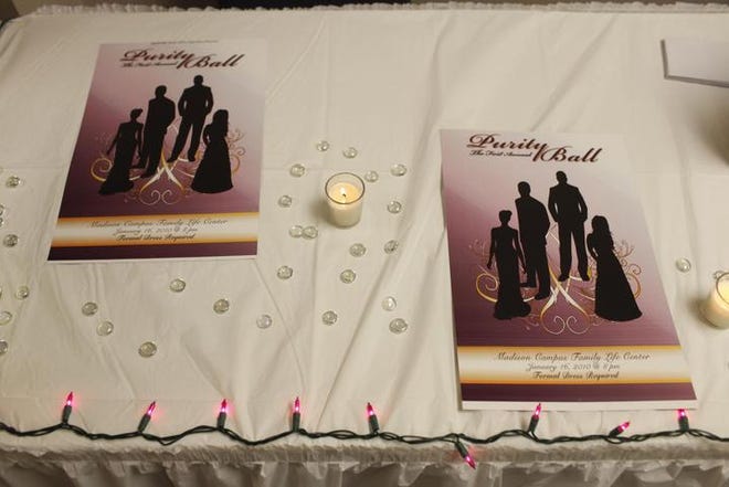 Posters for the Purity Ball are displayed on a table at the Seventh-day Adventist Madison church in Nashville, Tenn.