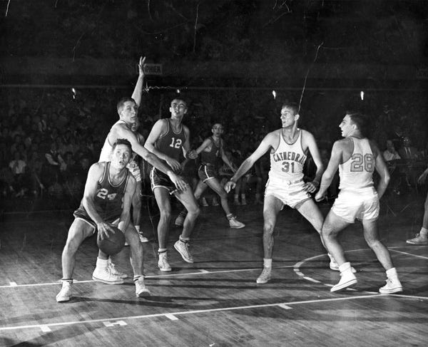 Picturing the Past recognizes City Basketball Tournament weekend with today’s photo from the 1953 tournament game between Feitshans High School (precursor to Southeast) and Cathedral Boys High School (precursor to Griffin High School, which later combined with Sacred Heart Academy to form Sacred Heart-Griffin High School).