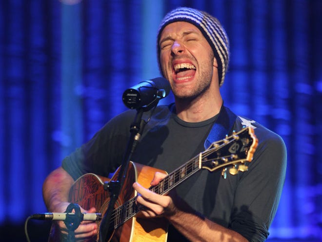 In this image released by Hope for Haiti Now, Chris Martin of Coldplay performs at the "Hope for Haiti Now: A Global Benefit for Earthquake Relief", Friday, Jan. 22, 2010 in London.