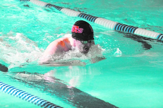 A Scots swimmer competes in the breast stroke at Monmouth College earlier this season.