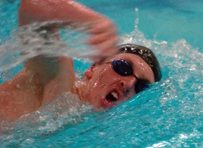 East Lyme's Billy Dumais wins the 500 freestyle Tuesday, January 26, 2010 in a personal best 5 minutes 11 seconds in a meet with Windham.