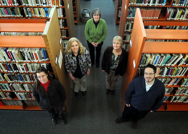 HCC’s Clarence Mitchell Library staff includes (left to right) Laura Watson, reference librarian; Pam Harrison, library technical assistant; Judy Moore, director of library services; Karen Graves, library technical assistant; and Michael Skwara, user services librarian.