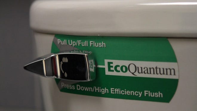 Low flush toilet inside PNC Bank in Delray Beach.