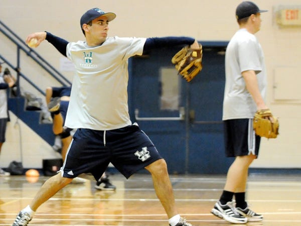Tim Timoney the rest of the UNCW baseball team were forced into the Hanover Gym for their first day of practice as cold, rainy weather moved into the area Saturday, Jan. 30, 2010.