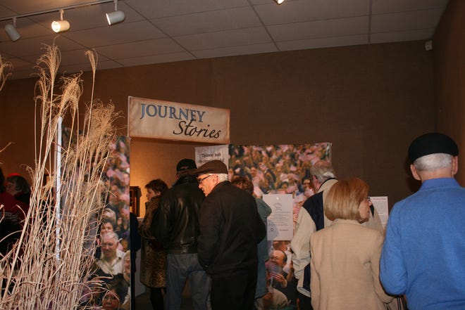 People line up to get into the Buchanan Center for the Arts Saturday for the debut of the traveling exhibit Journey Stories. The exhibition comes from the Smithsonian’s Museums on Main Street program.