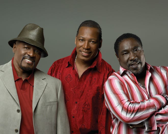 Walter Williams (left) and Eddie Levert (right) with third O’Jay member Eric Grant.