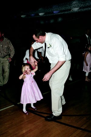 More than 115 families attended the annual father-daughter dance at the Warren County YMCA Saturday night.