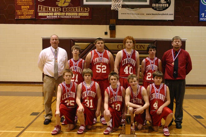 The Lewistown Indians lost 55-42 to Springfield Christ the King Thursday night to finish in 4th place in the 7-2A State Tournament. Front row from the left are Justin Burdess, Dakota Thomas, Brady Hardesty, Brian Kruzan, and Ethan Rice. Back row from the left are coach Mike Trone, Blain Myers, Ethan Sebree, Nathan Deushane, Steven Parrish, and coach Derek Dare.