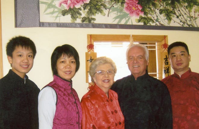 The Jia family, from left, Jason, his mother Kelly, and father, Paul, with their friends, Kay and John Gravdahl from Warwick. Not pictured, Jason’s sister, Jean.