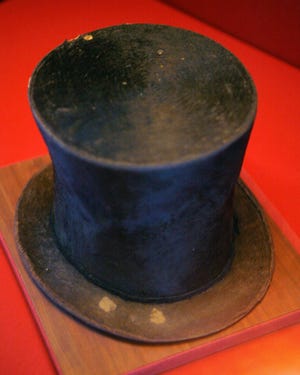 The stovepipe hat worn by Abraham Lincoln showing marks where his fingers fit on the brim, on display at the Abraham Lincoln Presidential Museum Feb. 10, 2010.