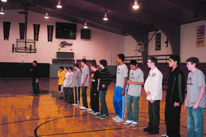 The MRJHS eighth grade basketball team is introduced at an assembly. The team will try to defend its state title beginning this weekend.