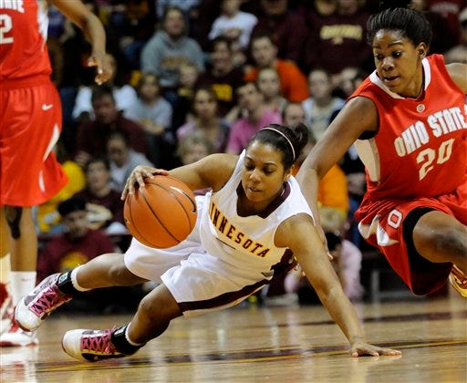 Minnesota's China Antoine beats Ohio State's Shavelle Little to the loose ball in the second half of Sunday's game in Minneapolis. Ohio State won 64-59.