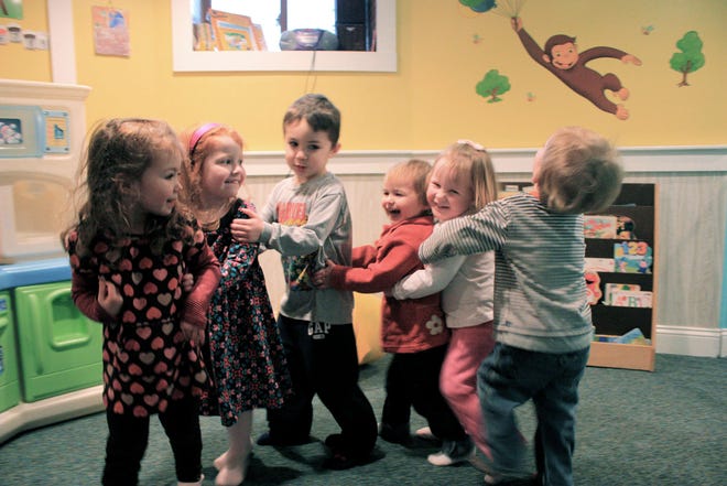 10:00a.m.  Quincy
Children at Little Sunflowers Childcare get some exercise on a rainy day by dancing	 

Photo by Wendy Arsenault , Quincy Subject: