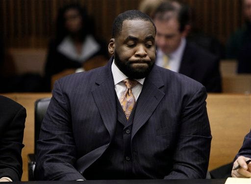 In this Jan. 20, 2010 file photo, former Detroit Mayor Kwame Kilpatrick appears during his restitution hearing in Detroit, in Wayne County Circuit Court. Judge David Groner has given Kilpatrick until the close of the business day Friday, Feb. 19, 2010, to make a $79,011 restitution payment to the city of Detroit for felonies he committed as mayor. Kilpatrick agreed to pay $1 million in restitution in late 2008 but later requested his monthly payments be reduced.