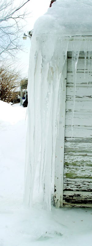This huge icicle has survived the recent warmer temperatures. Since it goes to the ground it’s not a dangerous one for walking near, but will likely leave some damage to the gutter and downspout.