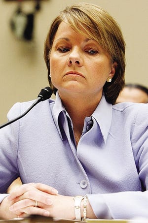 Ann Helsenfelt/the associated press
Angela Braly, president and chief executive officer of WellPoint Inc., testifies on Capitol Hill in Washington Wednesday before the House Oversight and Investigations subcommittee hearing on premium increases by Anthem Blue Cross.