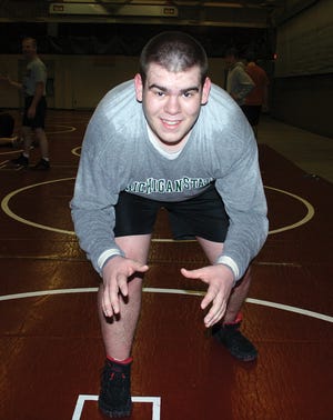 Portland senior heavyweight wrestler Kevin Zimmerman is one of six seniors who has led the Raiders to a 37-win season, as well as a district and regional championship this year.