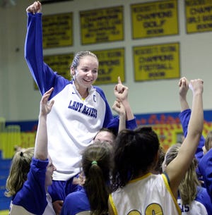 Assabet Valley's #12 Chelsea Joubert gets hoisted up in celebration after Thursday night's come back win over Littleton at Assabet Valley H.S. in Marlborough.