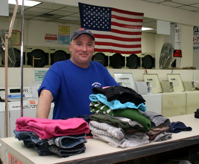 George Moniz hopes to serve wine and beer at his Raynham Laundry Center.