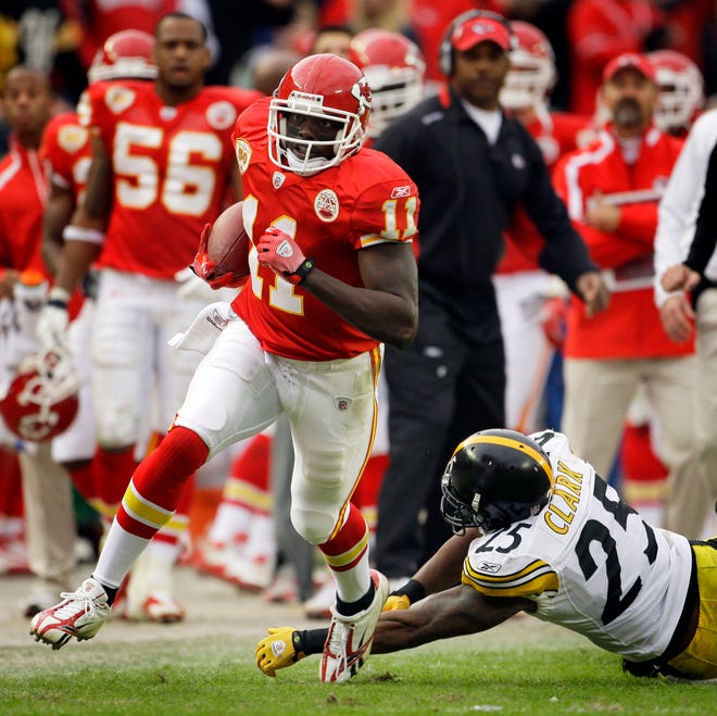 Kansas City Chiefs wide receiver Chris Chambers (11) gets past Pittsburgh Steelers safety Ryan Clark (25) to run for 61 yards, setting up a game-winning field goal during overtime of an NFL game Nov. 22 in Kansas City. The Chiefs won the game 27-24.