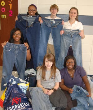 ECHS Beta Club members with some of the 150 pairs of jeans students donated to homeless teens. Back row: Janese Riley, Christopher Carpenter, Alexandra Visintainer; front row: Josie Alford, Kelsey Woodward, Cleo Alford. (Special to Effingham Now)
