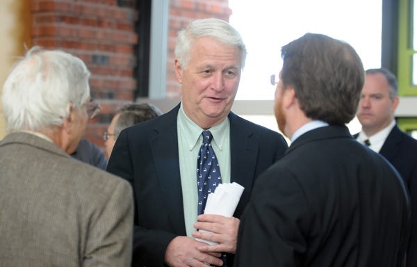 WEST BARNSTABLE -- 03/02/10 -- Congressman William Delahunt, talks with County Commissioner William Doherty, left, and Cape Cod Commission Executive Director Paul Niedzwiecki, right, at Cape Cod Community College after Tuesday's announcement of $32 million in American Recovery and Reinvestment Act Broadband Technology Opportunity Program funds