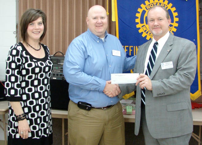Sunrise Rotary Club President Randy Shearouse, right, presents a $1,000 check to the YMCA of Coastal Georgia\u2019s Effingham unit. Accepting are YMCA-Effingham Executive Director Kim Dennis and YMCA-Effingham board member and Rotarian Joe Tallent. Sunrise Rotary Club meets at 7:30 a.m. Tuesdays at Guyton Christian Church Center. For information, visit effinghamrotary.org. (Special to Effingham Now)