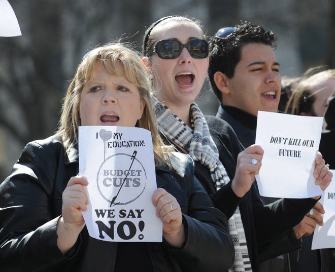 Dalton State College social work students Leigh Day (left) and Lauren Day join their peers in protest at the Georgia Capitol. The two stated their program is in jeopardy of being eliminated.