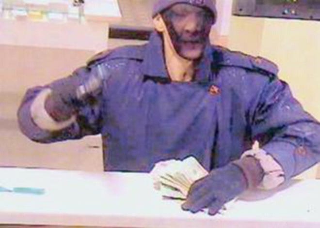 Surveillance image of the Citizens Bank in North Quincy being robbed on Jan. 25.