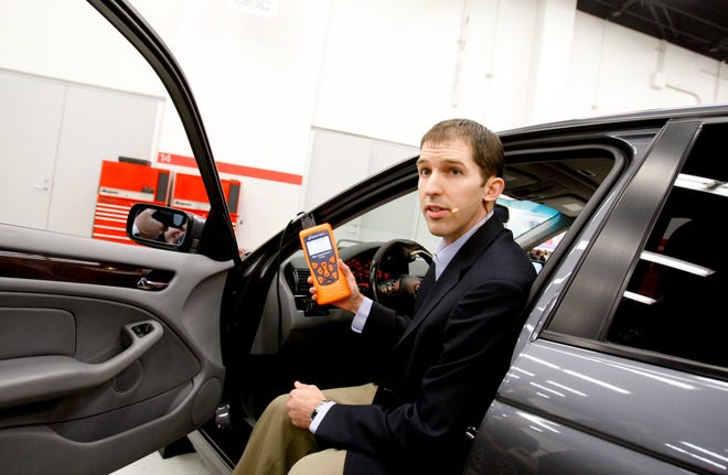 Dr. Matthew Schwall, Toyota's managing engineer of exponent's vehicle engineering, performs a pedal test on a BMW. Toyota says a professor's findings of faulty electronics are improbable.