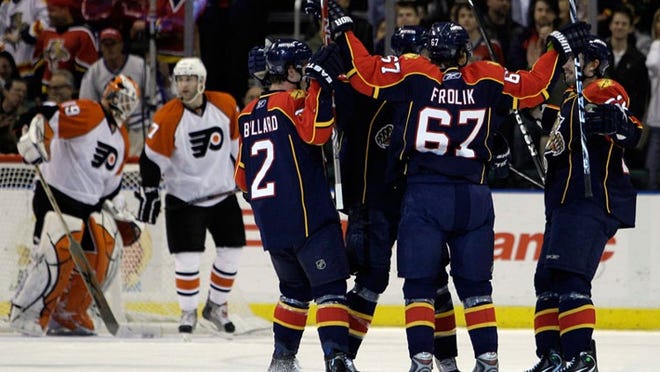 The Panthers celebrate a Michael Frolik goal against the Flyers on Wednesday.