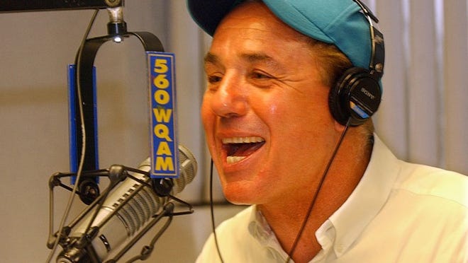 Jim Mandich, shown in 2005 behind the mic at WQAM, says he's done with talk radio but 'would love' to continue calling Dolphins games.