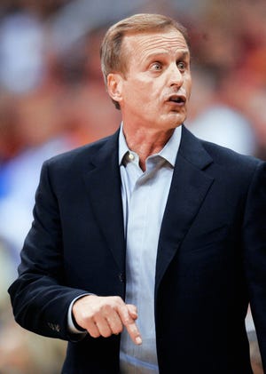Texas coach Rick Barnes sometimes goes without a tie during games. Barnes said he hasn’t put much thought into why he does so.AP Photo