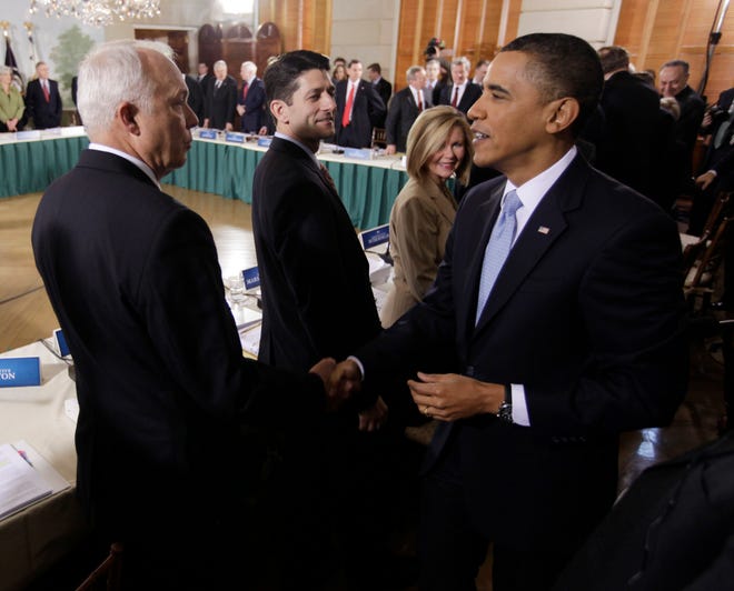 President Barack Obama (right) shakes hands with Rep. John Kline, R-Minn., at the Blair House, prior to the start of the health care summit. Also pictured are Rep. Paul Ryan, R-Wis., and Rep. Marsha Blackburn, R-Tenn. and the president.