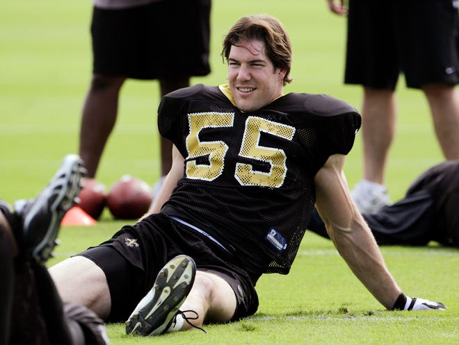 Ex-New Orleans linebacker Scott Fujita stretches before Super Bowl practice in February. After winning a Super Bowl, the free agent signed with the Browns.