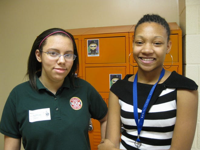 Highland Park freshmen Kennedy Simpson, left, and Desiree Abbott are active members of the school's Community Service Club. The girls said they enjoy the club because doing something for others help them feel good about themselves.
