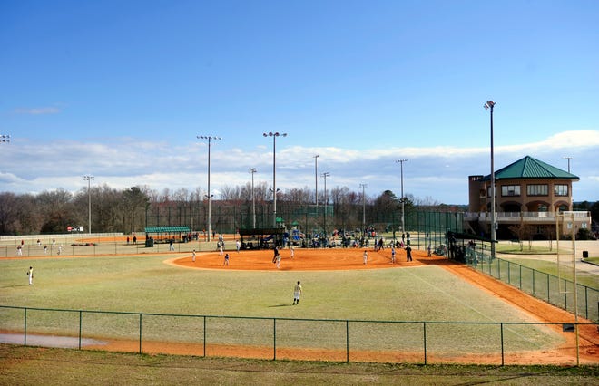 Children play on one of several baseball fields at Diamond Lakes Regional Park in Hephzibah. Augusta's youth baseball programs usually enroll 1,000 to 1,100 players for the summer season.