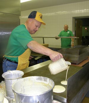 John McDowell made pancakes Saturday morning for the Greencastle Lions Club’s annual pancake breakfast, one the club’s major fundraisers.