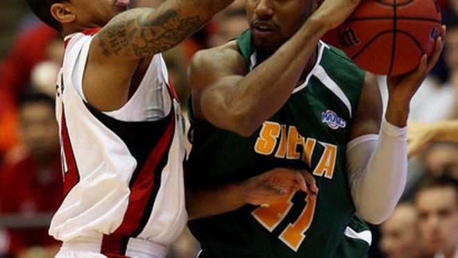 Kenny Hasbrouck (right) went undrafted after playing for Siena. He averaged 16.9 points per game for Rio Grande of the D-League.