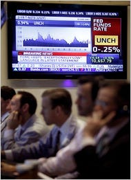 A screen at the New York Stock exchange with news about the Fed on Tuesday.