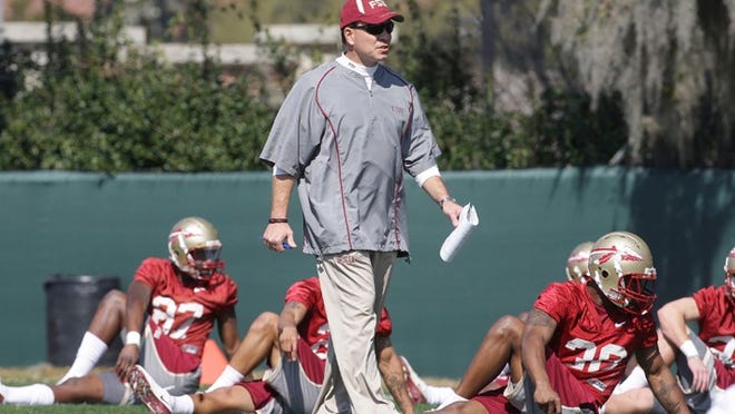 Jimbo Fisher roams the field during his first day of practice as FSU's head coach.