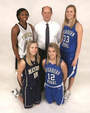 The All-City girls team -- Back left to right: Daria Sprew, Topeka High, coach Kevin Bordewick, Washburn Rural, Maggie Holmberg, Washburn Rural. Front, left to right: Jayde Reid, Hayden, Alexa Bordewick, Washburn Rural. Not pictured: Cierra Ceazer, Shawnee Heights.