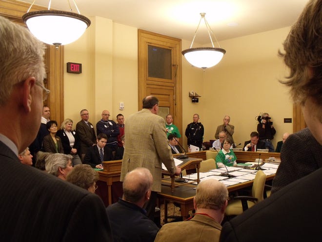 Michael Beal, vice president Balls Food Stores in Kansas City, Kan., speaks in opposition to a sugary drink tax Wednesday in the Capitol. The meeting drew a packed crowd with many people having to stand around the room.
