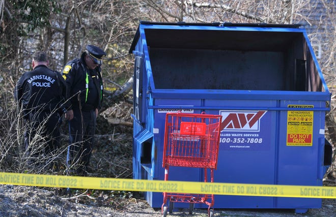 Hyannis -- 03/17/10 -- Barnstable Police investigate the discovery of a body found behind a dumpster off Hinckley Road in Hyannis Wednesday afternoon. Barnstable police identified the body as that of former Falmouth resident Dennis Sabo, 47.