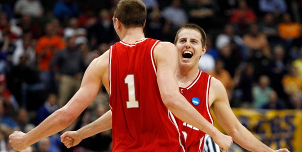 Cornell's Ryan Wittman, right, and Jeff Foote celebrate after defeating Temple 78-65 in NCAA first-round action on Friday.