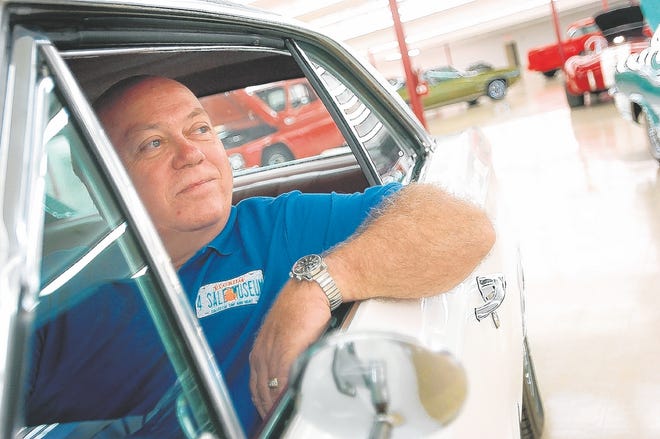 Former luxury home builder Bob Quandt, checking out a 1971 Chevrolet 
Chevelle, recently opened his 4 Sale Museum in Englewood. Restoring classic 
cars has been a longtime hobby for Quandt, who looks to turn his private 
passion into a source of income.